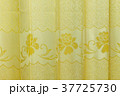 Closeup warm color curtains. 37725730