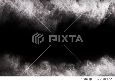 White powder on the black background. 37730472