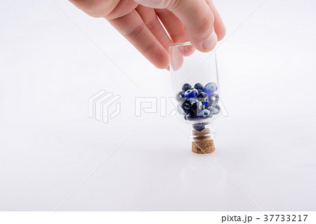 Little  glass bottle with blue evil eye beads 37733217