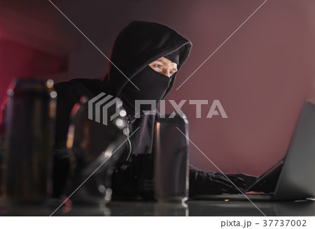 Orderly hacker typing in laptop Orderly hacker typing in laptop 37737002