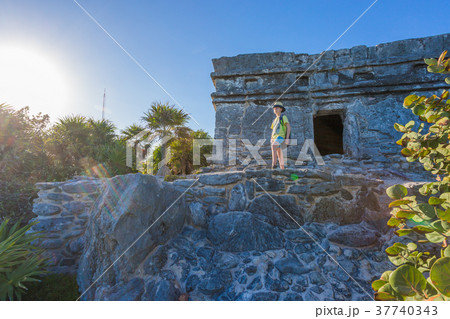 Kid on the top of antique ruins 37740343