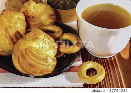Still life with tea and cakes 37744232