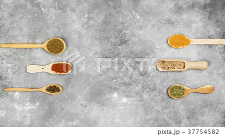 Various spices on a gray background. Top view Various spices on a gray background. Top view 37754582