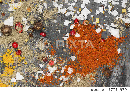 Various spices on a black background. Top view 37754979