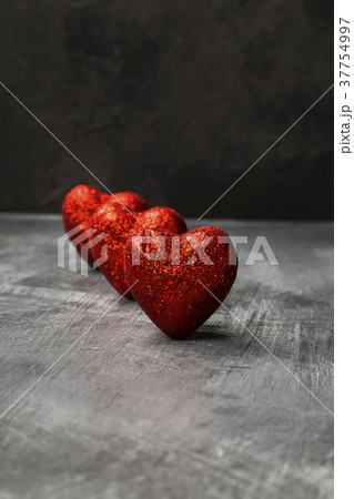 Red heart on a dark background Red heart on a dark background 37754997