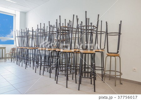 some stacked chairs 37756017