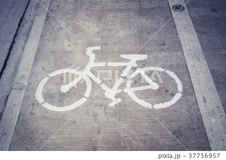Bike Lane Symbol, Bicycle white sign on road. 37756957