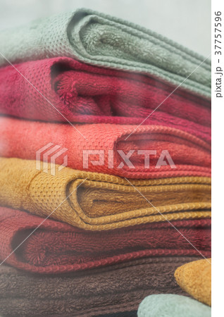 closeup of colorful bath towels pile in store 37757596