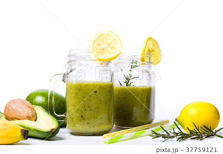 Avocado smoothie in a glass isolated 37759121