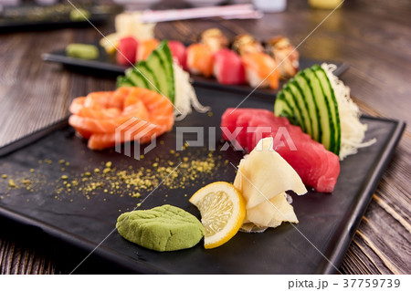 Closeup wasabi, lemon and white sushi ginger. 37759739