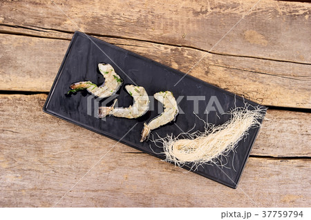 Served white shrimps, top view. Served white shrimps, top view. 37759794