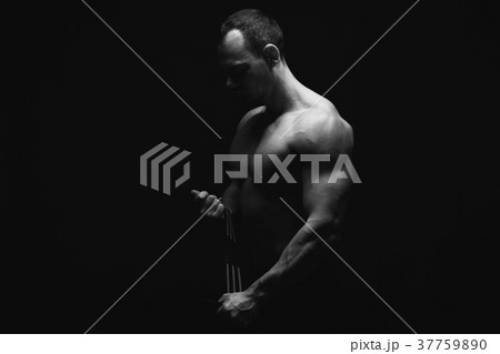 Strong athletic man showes naked muscular body 37759890