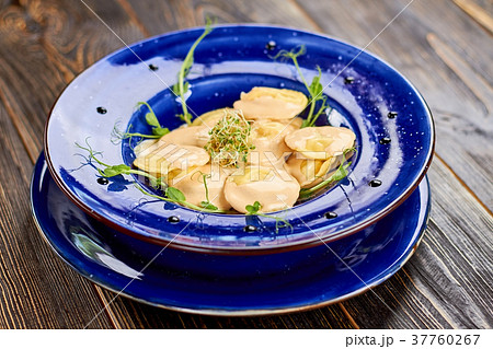 Top view dumplings with greens. 37760267