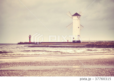 Windmill lighthouse in Swinoujscie, Poland. Windmill lighthouse in Swinoujscie, Poland. 37760315