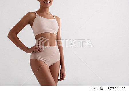 Healthy slender girl posing in underwear Healthy slender girl posing in underwear 37761105