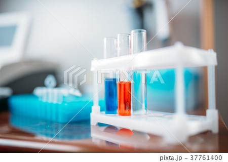 Laboratory tests in glass flasks closeup 37761400