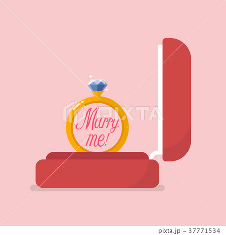 Red velvet box containing engagement ring 37771534