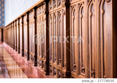Old wooden baroque furniture wall with bokeh 37778030