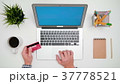 A Man's Hands Typing on the Laptop 37778521