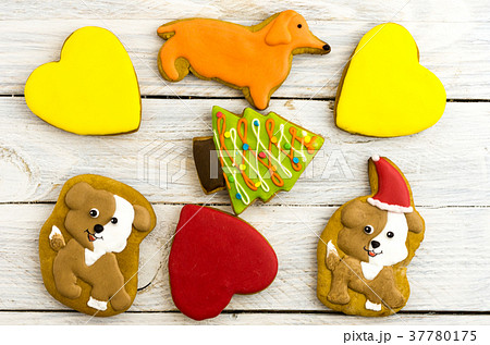Biscuits in the form of dogs, hearts. Biscuits in the form of dogs, hearts. 37780175