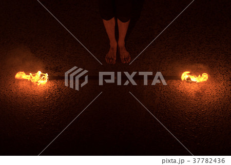 Fire Performance by a Man at Night 37782436