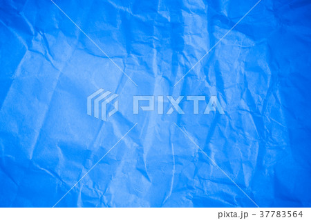 Crumpled blue paper background. 37783564