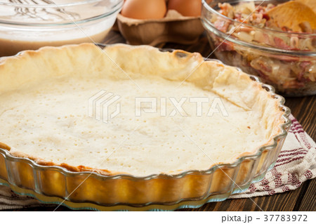 Dough ready to prepare a traditional quiche Dough ready to prepare a traditional quiche 37783972