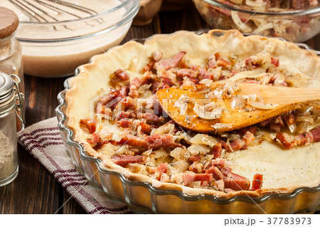 Making stuffing while preparing a quiche Making stuffing while preparing a quiche 37783973
