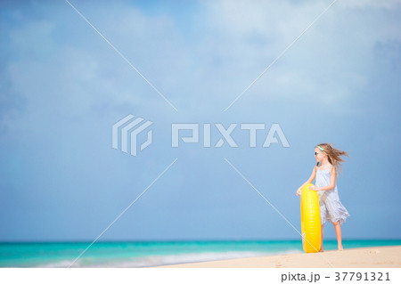Adorable girl with inflatable rubber circle on Adorable girl with inflatable rubber circle on 37791321