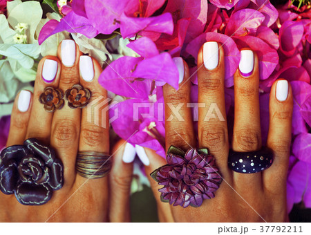 bright colorfull shot of african tanned hands with bright colorfull shot of african tanned hands with 37792211