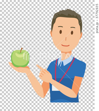 ネームプレートを着用している男性スタッフがりんごを持っている 37792835