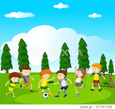Boys playing soccer in park 37797109