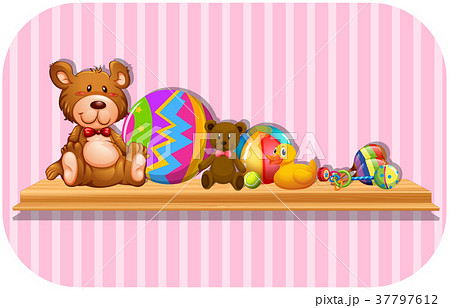 Teddy bears and balls on shelf 37797612