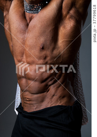 Muscular torso of sexy young male bodybuilder  37799618