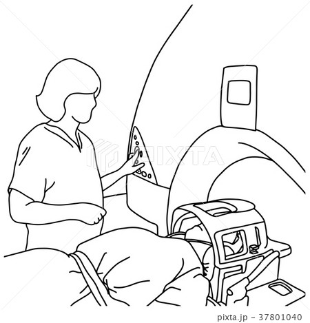 female specialist turning on MRI scanner female specialist turning on MRI scanner 37801040