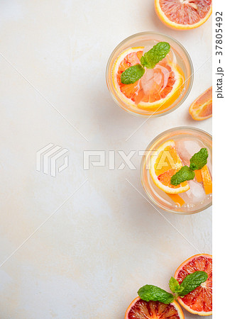 Cold refreshing drink with blood orange slices. Cold refreshing drink with blood orange slices. 37805492
