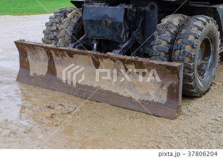 bulldozer by working closeup, sand bulldozer by working closeup, sand 37806204