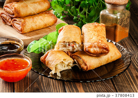 Spring rolls with chicken and vegetables Spring rolls with chicken and vegetables 37808413