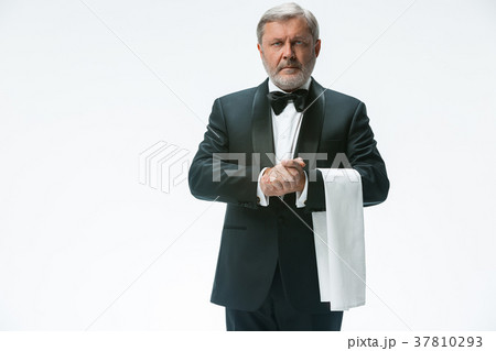 Senior waiter with white towel. Sign language in 37810293