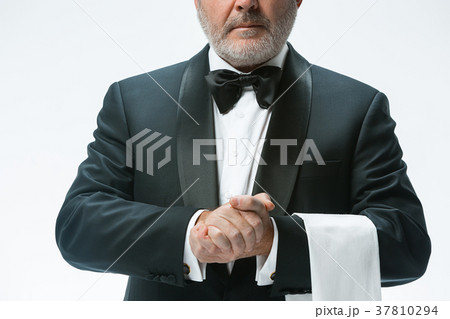 Senior waiter with white towel. Sign language in 37810294