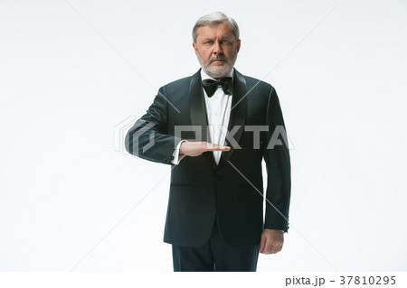 Senior waiter with white towel. Sign language in 37810295