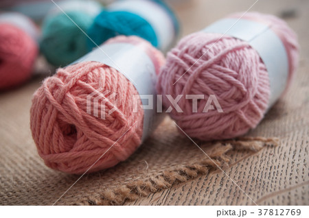 colorful wool balls on wooden table background colorful wool balls on wooden table background 37812769