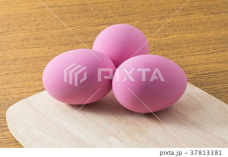Three Pink Century Egg on Cutting Board Three Pink Century Egg on Cutting Board 37813381