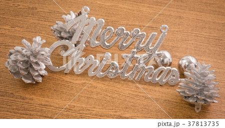 Merry Christmas Text with Baubles and Pinecones Merry Christmas Text with Baubles and Pinecones 37813735