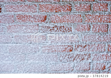 snow wall of red brick.background snow wall of red brick.background 37814219