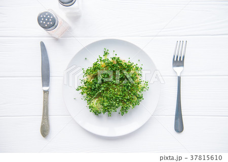 plate with fresh organic sprout micro greens 37815610