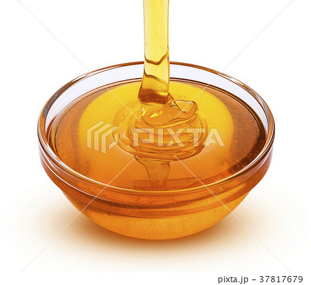 Pouring honey isolated on white background Pouring honey isolated on white background 37817679