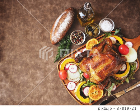 Roasted turkey in thanksgiving on brown background 37819721