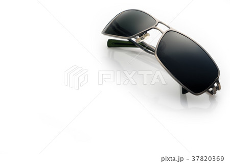 Sunglasses on white background with soft focus Sunglasses on white background with soft focus 37820369