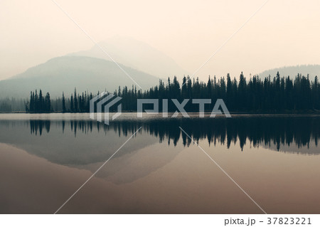 Foggy mountain lake 37823221